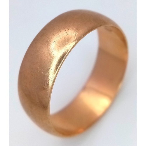 17 - A Vintage 9K Yellow Gold Band Ring. UK hallmarks. 7mm width. Size T 1/2. 5.6g.
