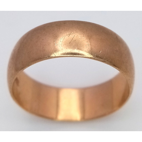 17 - A Vintage 9K Yellow Gold Band Ring. UK hallmarks. 7mm width. Size T 1/2. 5.6g.