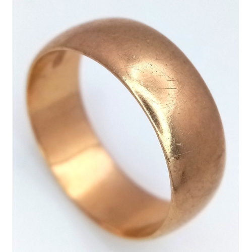 17 - A Vintage 9K Yellow Gold Band Ring. UK hallmarks. 7mm width. Size T 1/2. 5.6g.