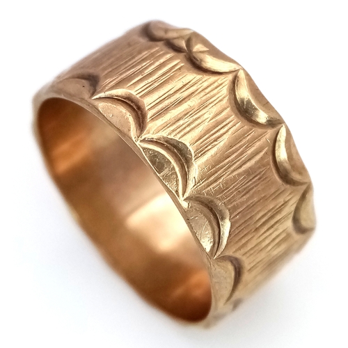 3 - A Vintage Hallmarked 9K Gold Band Ring. Decorative geometric pattern exterior. 9mm width. Size O. 4.... 