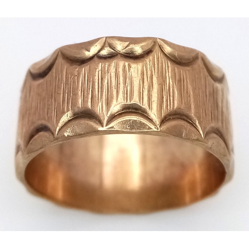 3 - A Vintage Hallmarked 9K Gold Band Ring. Decorative geometric pattern exterior. 9mm width. Size O. 4.... 