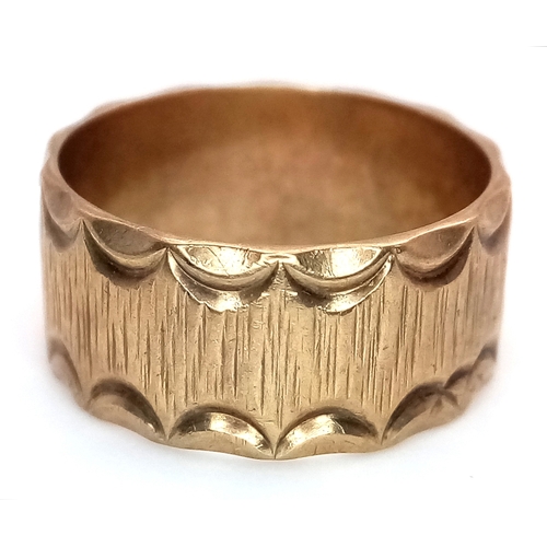 3 - A Vintage Hallmarked 9K Gold Band Ring. Decorative geometric pattern exterior. 9mm width. Size O. 4.... 