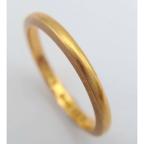 31 - A 22K Yellow Gold Band Ring. UK hallmarks. 3mm width. Size L. 2.65g.
