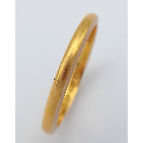 31 - A 22K Yellow Gold Band Ring. UK hallmarks. 3mm width. Size L. 2.65g.