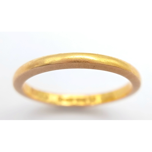 31 - A 22K Yellow Gold Band Ring. UK hallmarks. 3mm width. Size L. 2.65g.