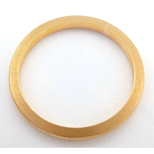 31 - A 22K Yellow Gold Band Ring. UK hallmarks. 3mm width. Size L. 2.65g.