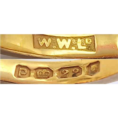 31 - A 22K Yellow Gold Band Ring. UK hallmarks. 3mm width. Size L. 2.65g.