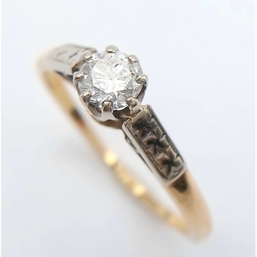 44 - An 18K Gold and Platinum Diamond Solitaire Ring. 0.25ct round brilliant cut diamond. Size L 1/2. 2g ... 
