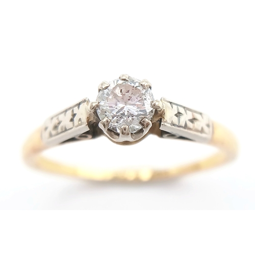 44 - An 18K Gold and Platinum Diamond Solitaire Ring. 0.25ct round brilliant cut diamond. Size L 1/2. 2g ... 