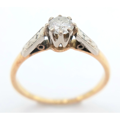 44 - An 18K Gold and Platinum Diamond Solitaire Ring. 0.25ct round brilliant cut diamond. Size L 1/2. 2g ... 