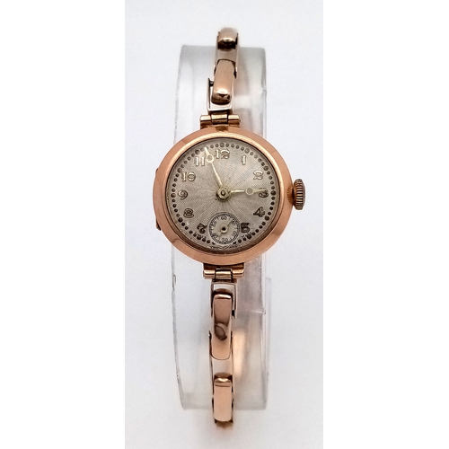 553 - Ladies Antique 9 CARAT GOLD ART DECO WRISTWATCH with 9 CARAT EXPANDABLE BRACELET.  Clear hallmark fo... 