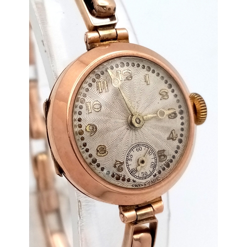 553 - Ladies Antique 9 CARAT GOLD ART DECO WRISTWATCH with 9 CARAT EXPANDABLE BRACELET.  Clear hallmark fo... 