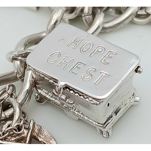 602 - Vintage SILVER CHARM BRACELET absolutely full of interesting and unusual SILVER CHARMS. To include T... 