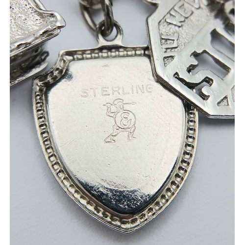 602 - Vintage SILVER CHARM BRACELET absolutely full of interesting and unusual SILVER CHARMS. To include T... 