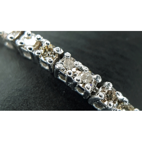 1260 - AN 18K WHITE GOLD, DIAMOND SET, TENNIS LINE BRACELET. 1.75CTW. 7.6G. SC 1068