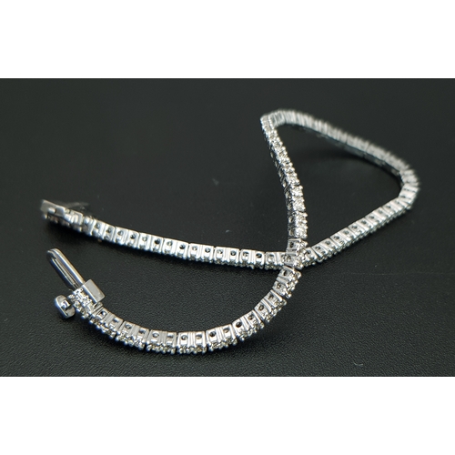 1260 - AN 18K WHITE GOLD, DIAMOND SET, TENNIS LINE BRACELET. 1.75CTW. 7.6G. SC 1068