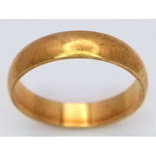 45 - An 18K Yellow Gold Band Ring. UK hallmarks. 4mm width. Size M. 3.25g.