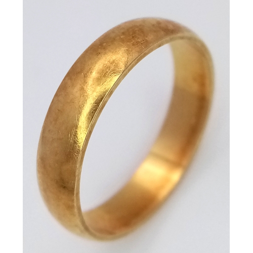 45 - An 18K Yellow Gold Band Ring. UK hallmarks. 4mm width. Size M. 3.25g.
