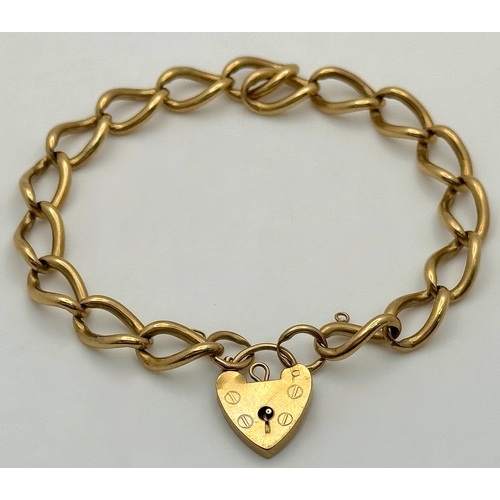 23 - A Vintage Curb Link Chain Bracelet with Heart Clasp. 20cm. 23g.