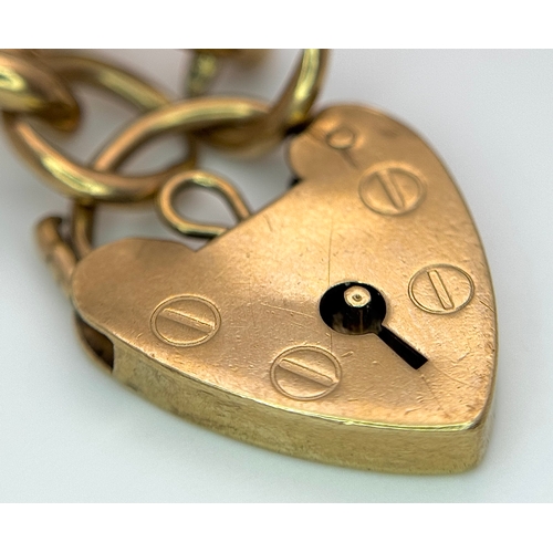 23 - A Vintage Curb Link Chain Bracelet with Heart Clasp. 20cm. 23g.