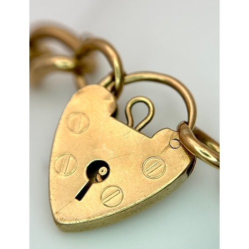23 - A Vintage Curb Link Chain Bracelet with Heart Clasp. 20cm. 23g.