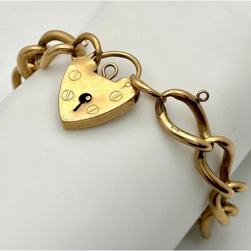 23 - A Vintage Curb Link Chain Bracelet with Heart Clasp. 20cm. 23g.