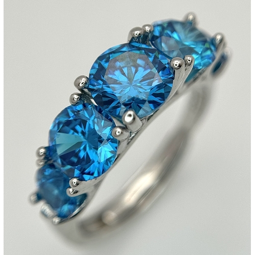1237 - Four Stone Set Silver Rings (adjustable) and a Pair of Moissanite Silver Stud Earrings with a certif... 