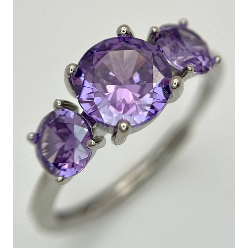 1237 - Four Stone Set Silver Rings (adjustable) and a Pair of Moissanite Silver Stud Earrings with a certif... 
