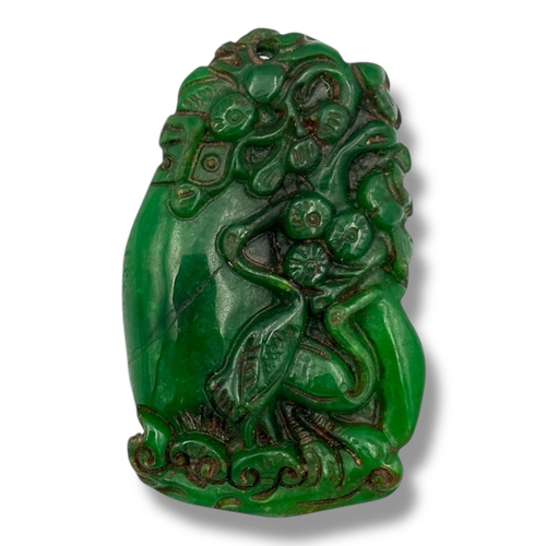 1254 - A lovely antique Chinese hand carved jadeite floral motif pendant, relief-carved botanical decoratio... 