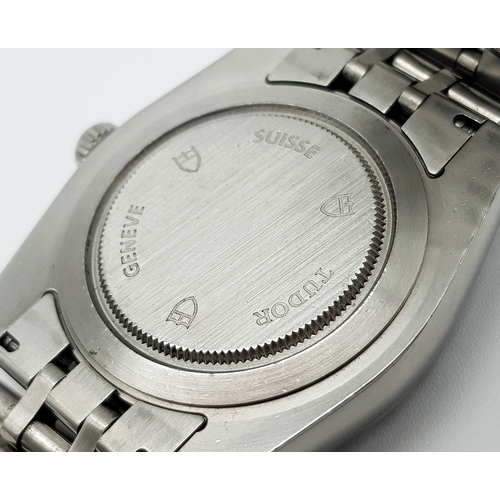 24 - A Classic Tudor Day-Date Automatic Gents Watch. Stainless steel bracelet and case - 41mm. Cut groove... 