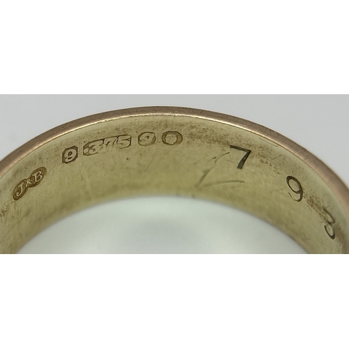 25 - A 9K Yellow Gold Band Ring with Geometric Pattern. 5mm width. Size L 1/2. 2.75g.