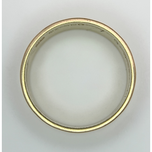 25 - A 9K Yellow Gold Band Ring with Geometric Pattern. 5mm width. Size L 1/2. 2.75g.