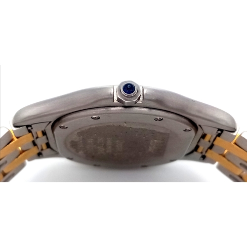 38 - A Vintage Cartier Panthere Cougar Watch. Model 187904. Stainless steel with gold, bracelet and case ... 