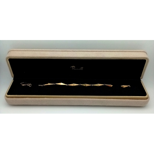 40 - A Cleopatra 18K Yellow Gold Faceted Barrel Link Classic Bracelet. Approx 18.5cm length. Total weight... 
