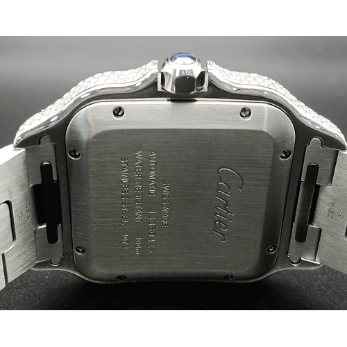 156 - A Custom Diamond Cartier Santos Automatic Gents Dress Watch. Model WSSA0009. Stainless steel diamond... 