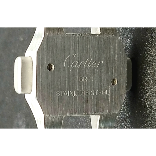 156 - A Custom Diamond Cartier Santos Automatic Gents Dress Watch. Model WSSA0009. Stainless steel diamond... 
