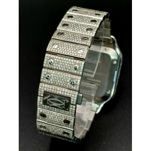 156 - A Custom Diamond Cartier Santos Automatic Gents Dress Watch. Model WSSA0009. Stainless steel diamond... 