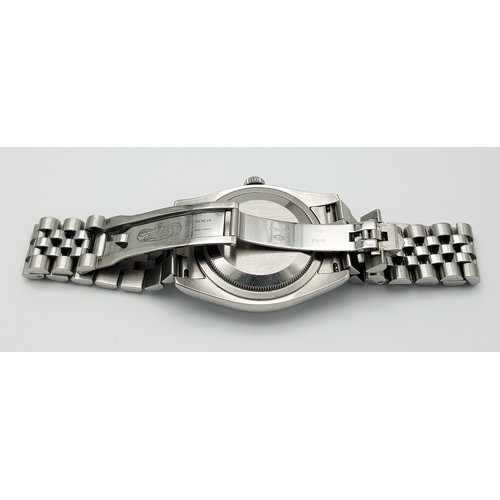 696 - A Rolex Oyster Perpetual Datejust Gents Watch. Stainless steel bracelet and case - 36mm. Black dial ... 