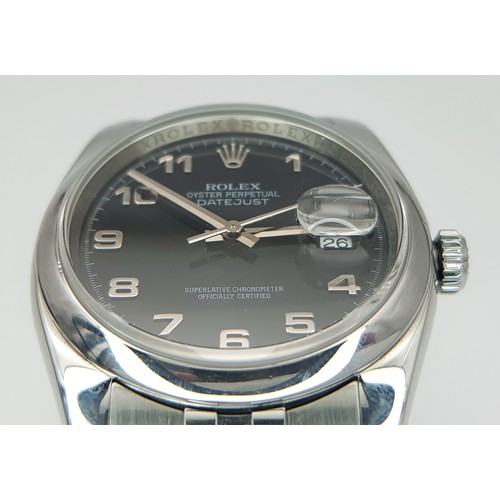 696 - A Rolex Oyster Perpetual Datejust Gents Watch. Stainless steel bracelet and case - 36mm. Black dial ... 