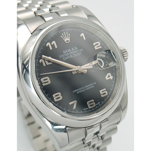 696 - A Rolex Oyster Perpetual Datejust Gents Watch. Stainless steel bracelet and case - 36mm. Black dial ... 