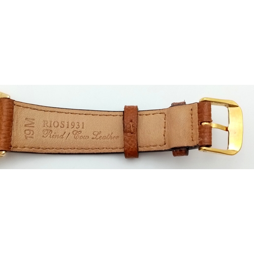 1819 - A Vintage 18K Gold Rolex Oyster Perpetual Gents Watch. Brown leather strap. 18K gold case - 34mm. Fl... 