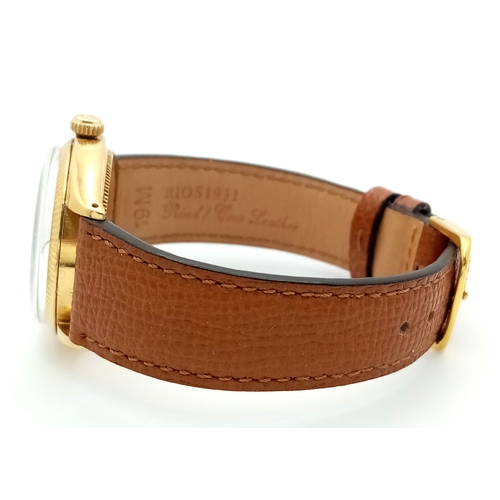 1819 - A Vintage 18K Gold Rolex Oyster Perpetual Gents Watch. Brown leather strap. 18K gold case - 34mm. Fl... 
