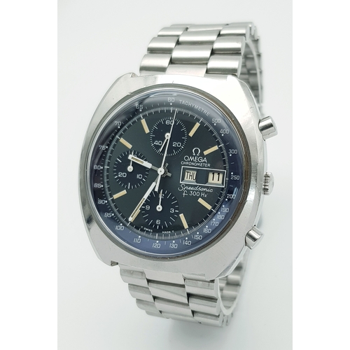 A Vintage Omega Speedsonic F300hz Quartz Chronograph Gents Watch. Stainless steel bracelet and case - 44mm. Silver tone and blue dial with three sub dials plus day/date windows. In working order. PAC1089.