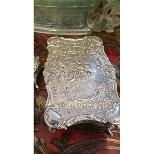 36 - A SET OF EARLY 20TH CENTURY SILVER MINIATURE FURNITURE, C.1900the miniature set comprising a dining ... 