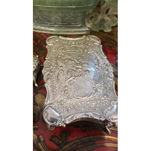36 - A SET OF EARLY 20TH CENTURY SILVER MINIATURE FURNITURE, C.1900the miniature set comprising a dining ... 