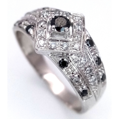 An 18K White Gold, Diamond And Sapphire Set Ring. 3.9G, Size O. Sc 3070