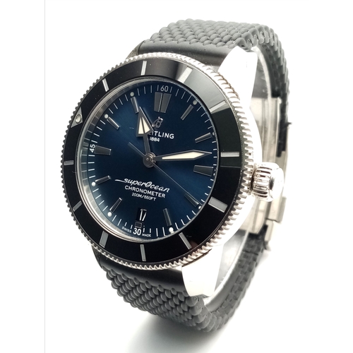 A Breitling Superocean Automatic Gents Watch. Model AB2030. Water resistant to 200M. Textured black rubber strap with stainless steel fold-over clasp. Metallic blue dial with date window and silver-tone markers. In good condition and working order. Comes with box and an array of papers. Ref: 028698.