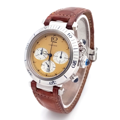 A Pasha de Cartier Quartz Chronograph Gents Watch. Brown leather strap with fold-over clasp. Stainless steel case - 38mm. Two-tone dial with three sub dials. Rotating bezel. Comes with a Cartier pouch and WCSA report. Ref: 028680.