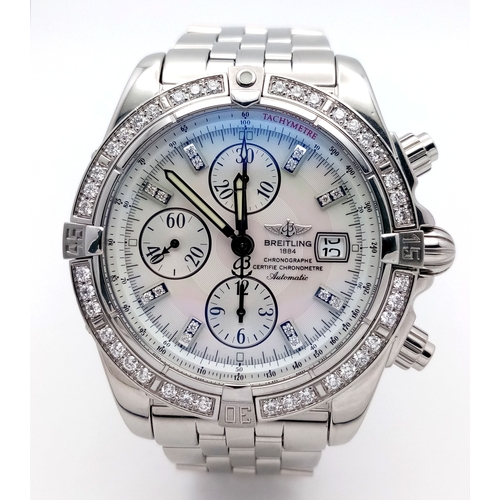A Breitling Chronomat Evolution Automatic Gents Watch. Model A13356. Stainless steel bracelet and case - 44mm. Mother of pearl dial with three sub dials and date window. Water resistant to 300m. Diamond set rotating bezel. In good condition and working order. Comes with a Breitling pouch, Watch Register and WCSA report. Ref: 028670