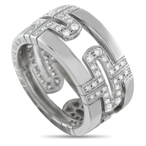 A Bvlgari Parentesi 18K White Gold 0.72ct Diamond Ring. Crafted in 18K white gold, it features a 14mm wide-band form. The bracket-shaped Parentesi motifs repeat across the openworked center, with Diamonds set within them.  Good Condition, comes with a gift box. Ring size: 8 (UK size P½). Total weight: 10.9 grams. *This item is held at Cadmore USA Office in Pennsylvania, USA and will be shipped from there. Buyers will be responsible for direct shipping payments.*
